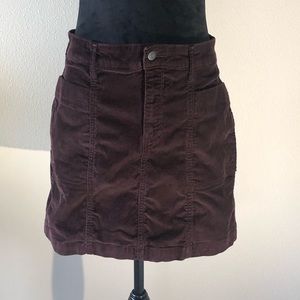Corduroy maroon, above the knee skirt. Size 6